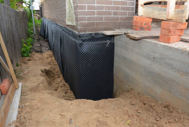 Happy homeowners after waterproofing job in Clarksville